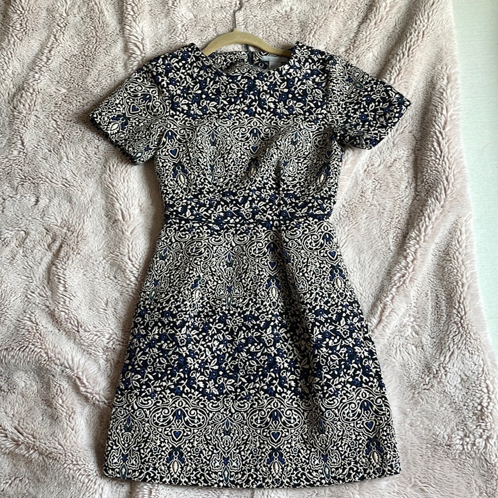 H&M size Small short sleeved dress. Blue, tan and black detail.